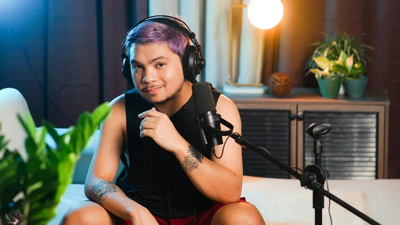 Beginner YouTube creator with a minimal home recording setup — ring light, laptop, simple background